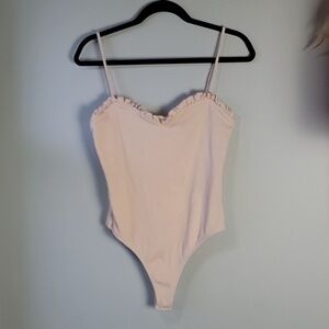 Privacy please ribbed cream ruffle trim bodysuit